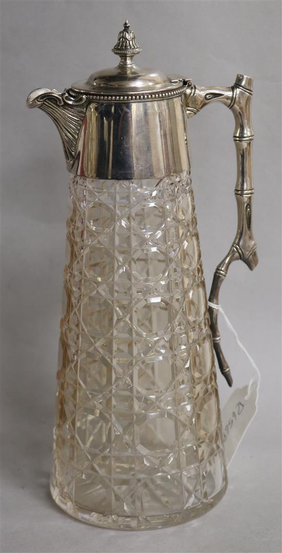 A late Victorian silver mounted cut glass claret jug, Goldsmiths & Silversmiths, Sheffield, 1898, 26.5cm.